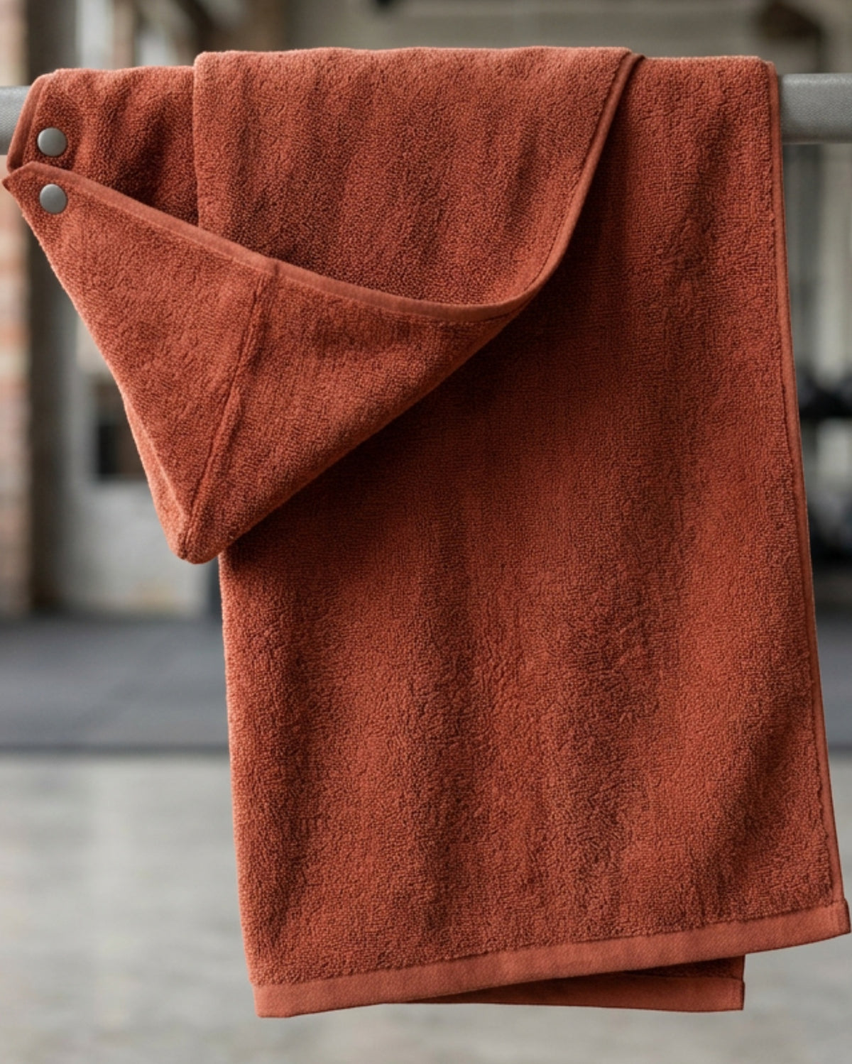 Coue Snap-Hood Sports Towel 100 x 50 cm Terracotta - Lifestyle view